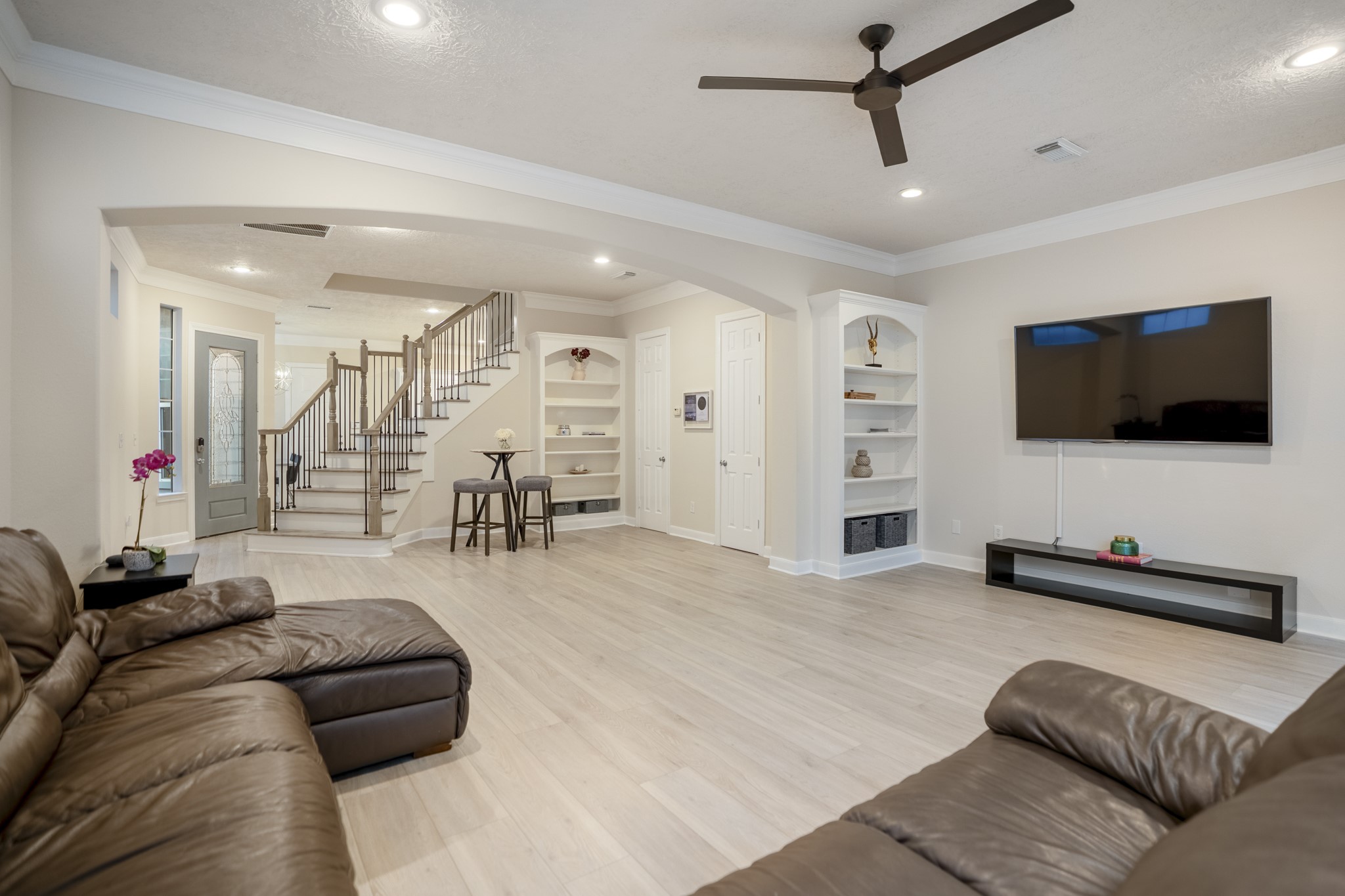 4236 Drake Street Houston, TX 77005 - Photo 5 of 43 Angle showing the expansive living room overlooking the dining area.
