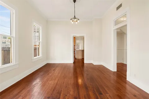 a kitchen with stainless steel appliances granite countertop a granite counter tops and a hard wood floors