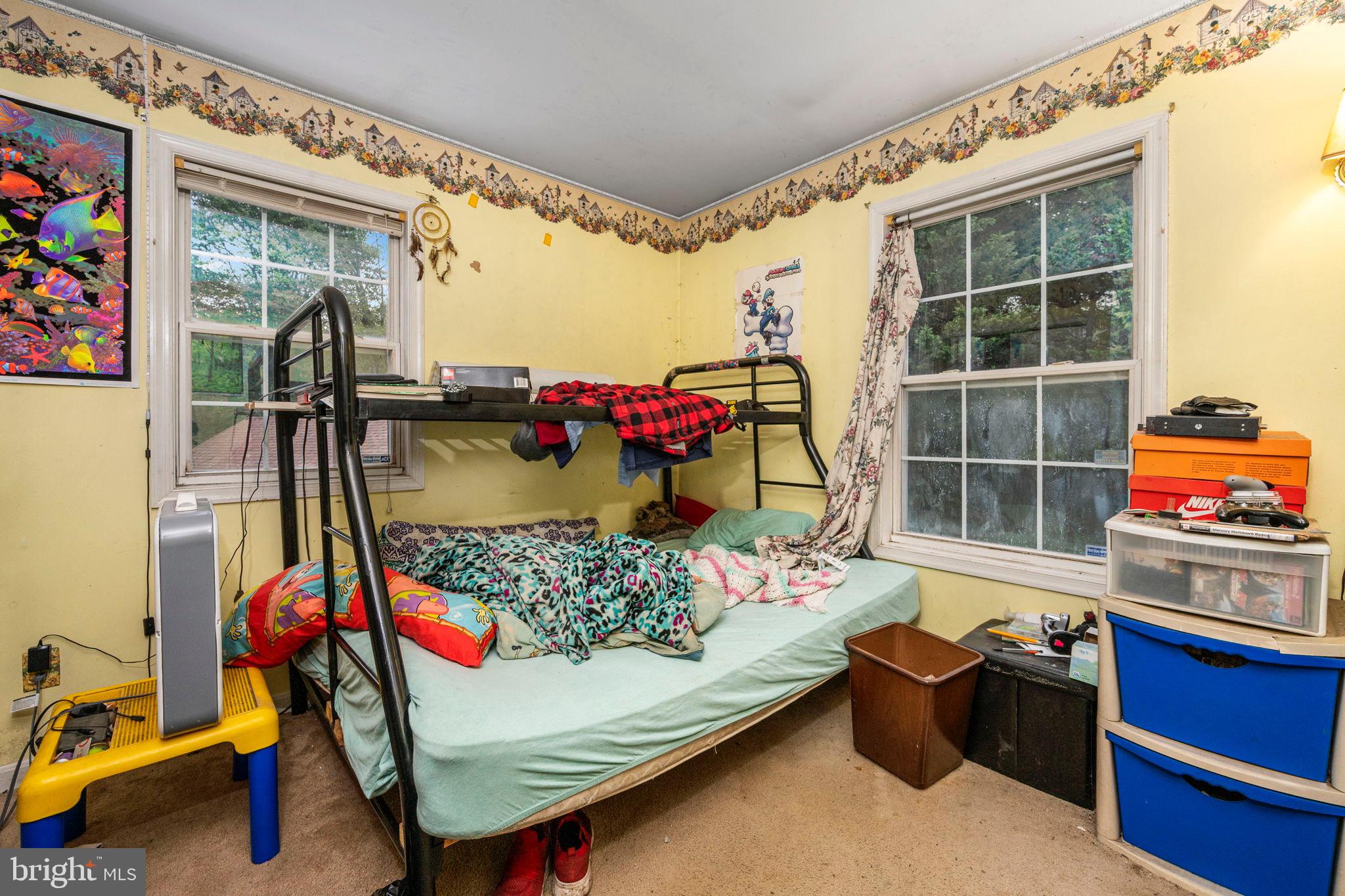 341 Goosemar Road Rising Sun, MD 21911 - Photo 12 of 24 a bedroom with furniture and a window