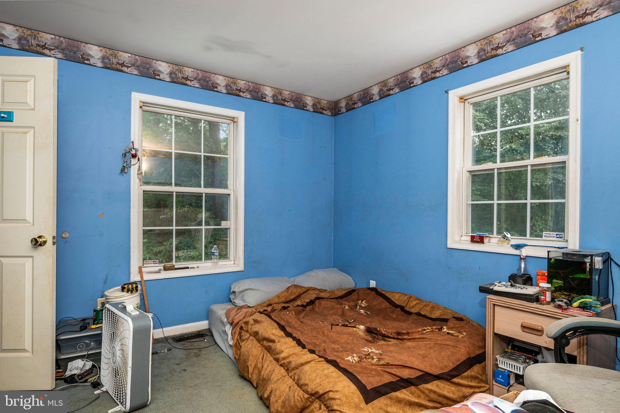 341 Goosemar Road Rising Sun, MD 21911 - Photo 13 of 24 a bedroom with a bed and a window