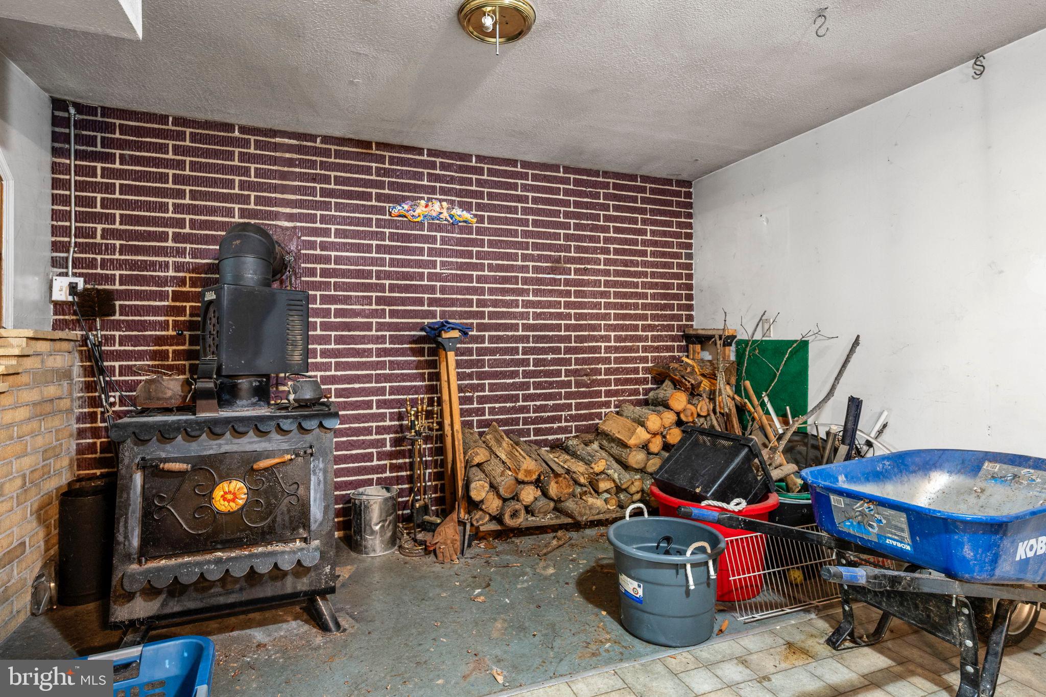 341 Goosemar Road Rising Sun, MD 21911 - Photo 15 of 24 a living room with furniture and a fireplace