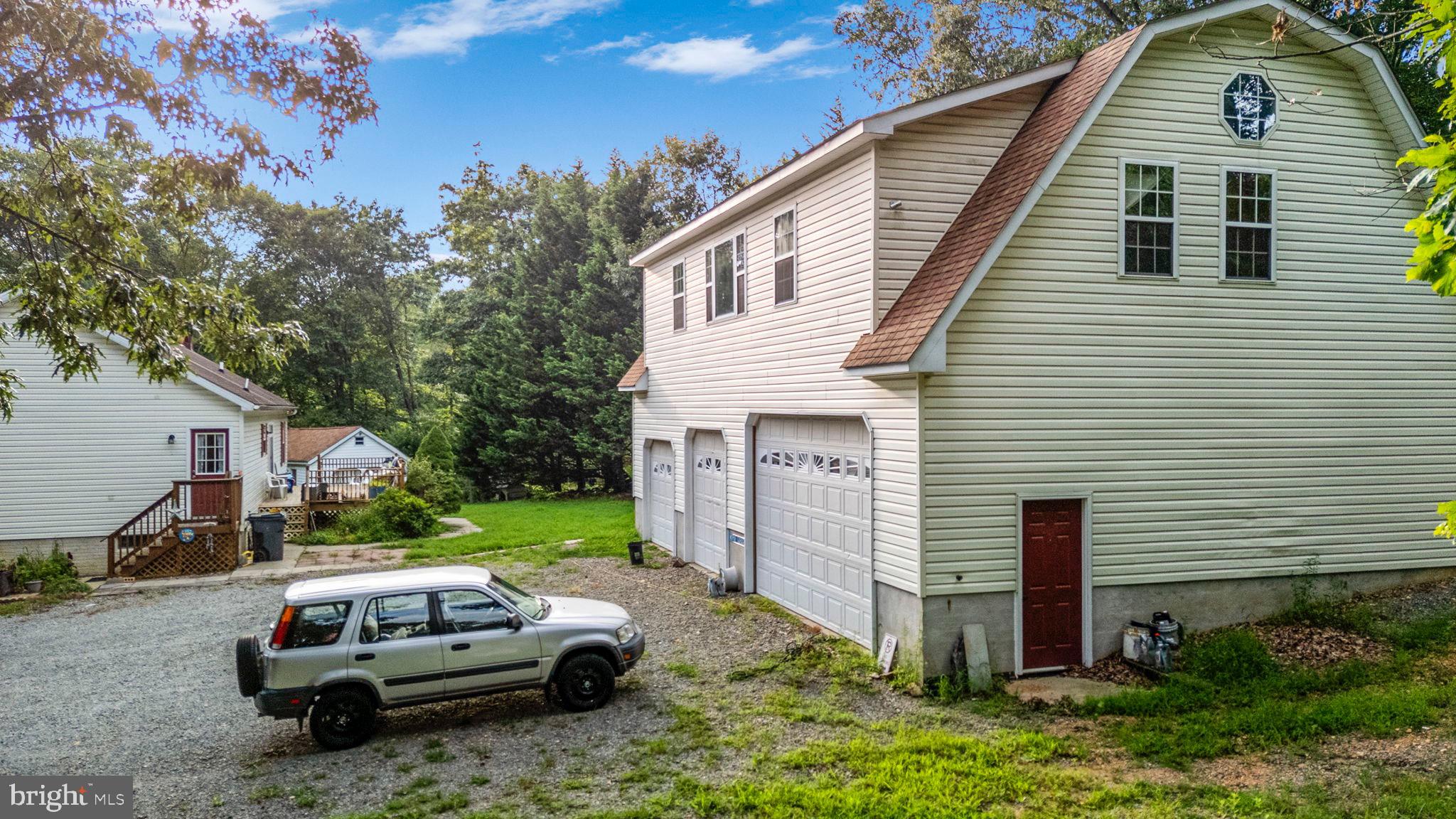 341 Goosemar Road Rising Sun, MD 21911 - Photo 20 of 24 a front view of a house with a garden