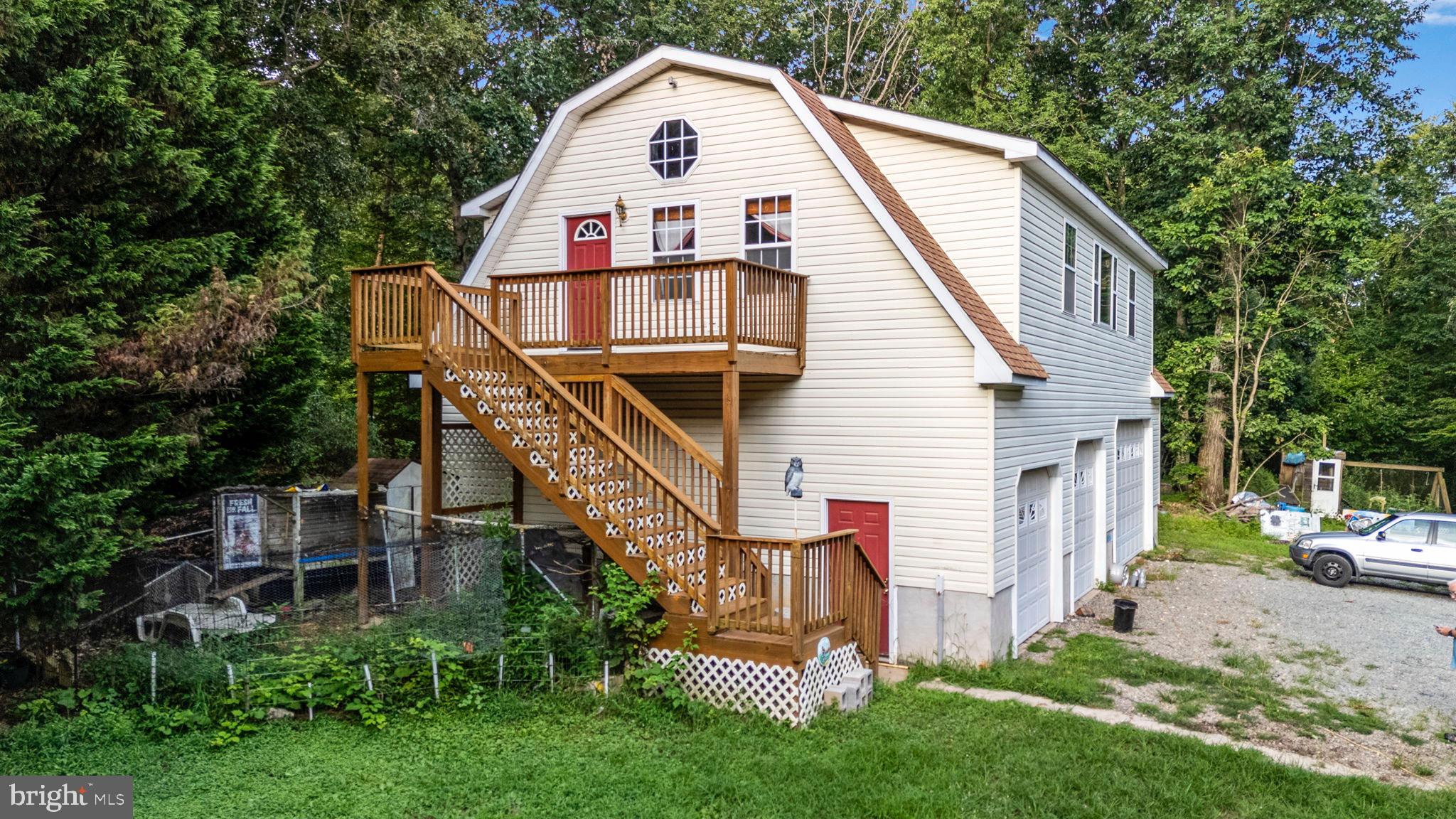 341 Goosemar Road Rising Sun, MD 21911 - Photo 21 of 24 a view of a house with a yard and large trees