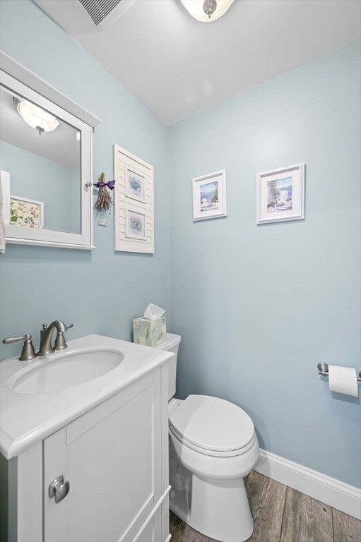 6 Beechwood Circle Boxford, MA 01921 - Photo 23 of 42 a bathroom with a sink mirror and toilet