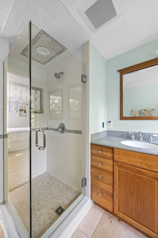 6 Beechwood Circle Boxford, MA 01921 - Photo 26 of 42 a bathroom with a granite countertop sink mirror and bathtub