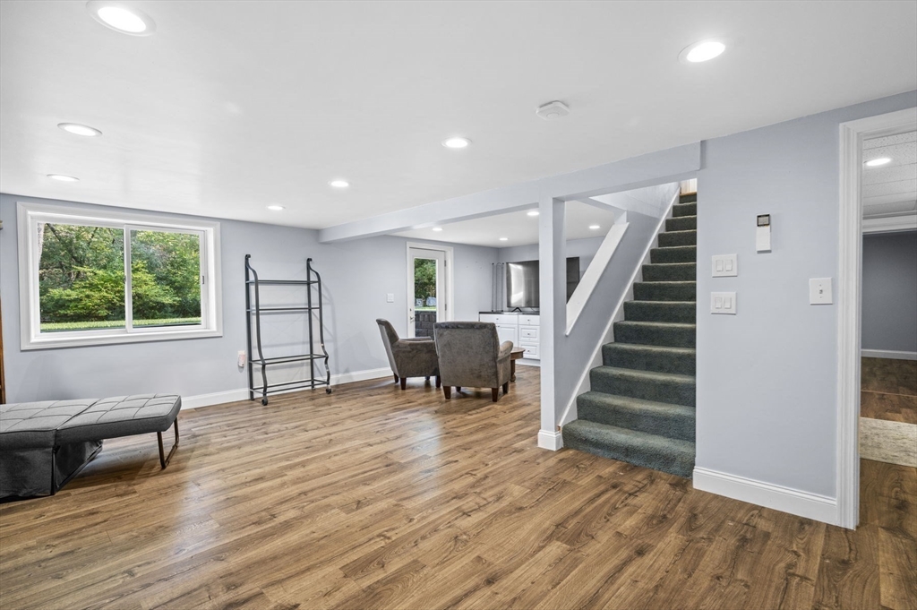 6 Beechwood Circle Boxford, MA 01921 - Photo 35 of 42 a living room with furniture and a wooden floor