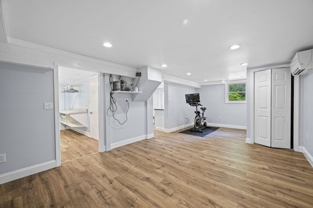 6 Beechwood Circle Boxford, MA 01921 - Photo 38 of 42 a view of a room with wooden floor and windows