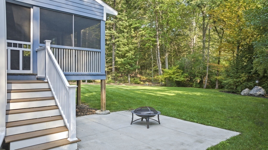 6 Beechwood Circle Boxford, MA 01921 - Photo 40 of 42 a view of backyard with seating space and deck