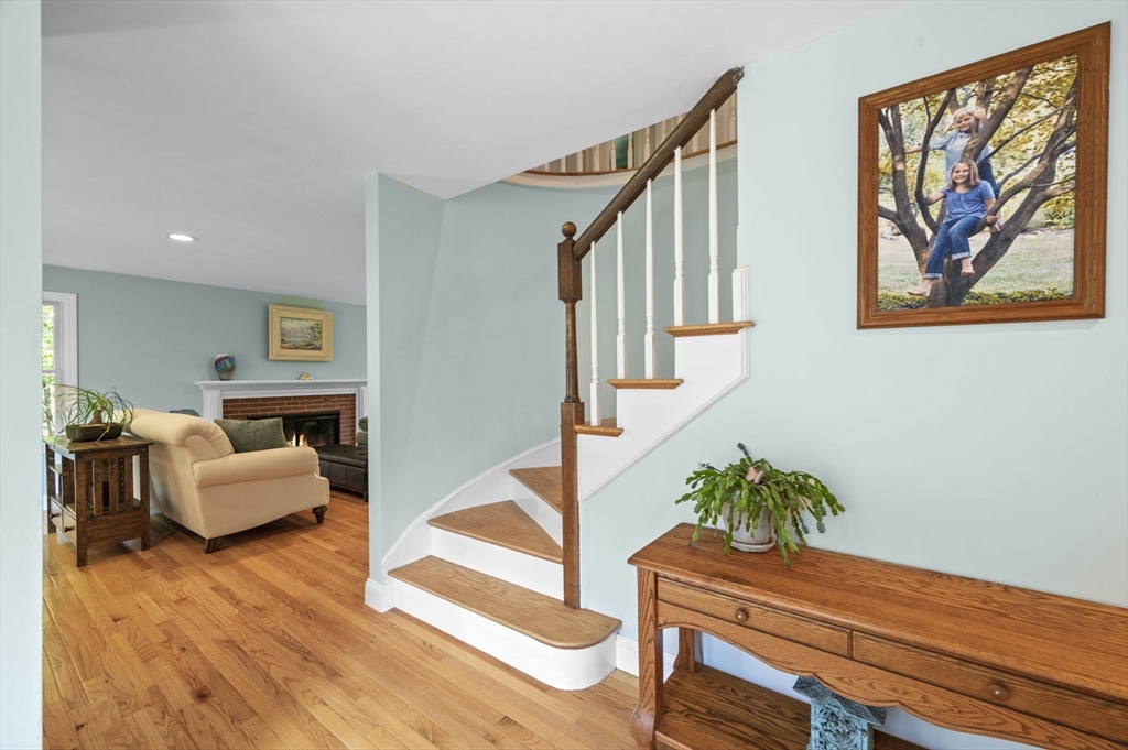 6 Beechwood Circle Boxford, MA 01921 - Photo 4 of 42 a living room with furniture and wooden floor