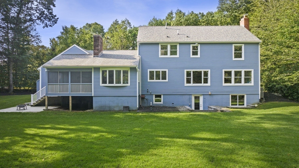 6 Beechwood Circle Boxford, MA 01921 - Photo 42 of 42 a house that is sitting in the grass