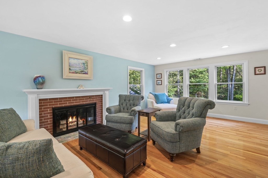 6 Beechwood Circle Boxford, MA 01921 - Photo 5 of 42 a living room with furniture and a fireplace