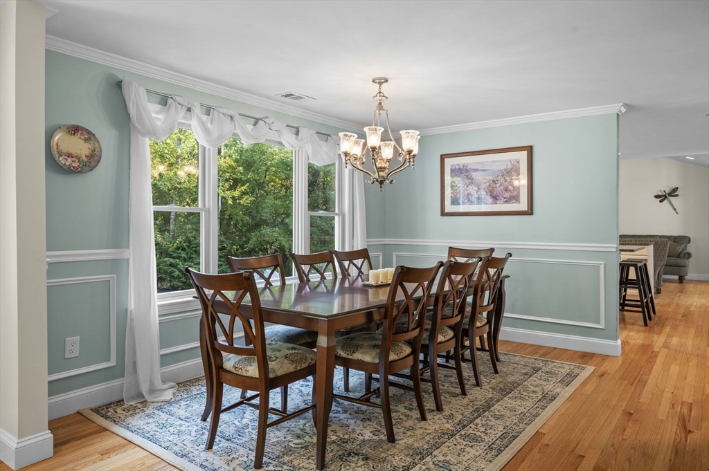 6 Beechwood Circle Boxford, MA 01921 - Photo 10 of 42 a view of a dining room with furniture window and wooden floor