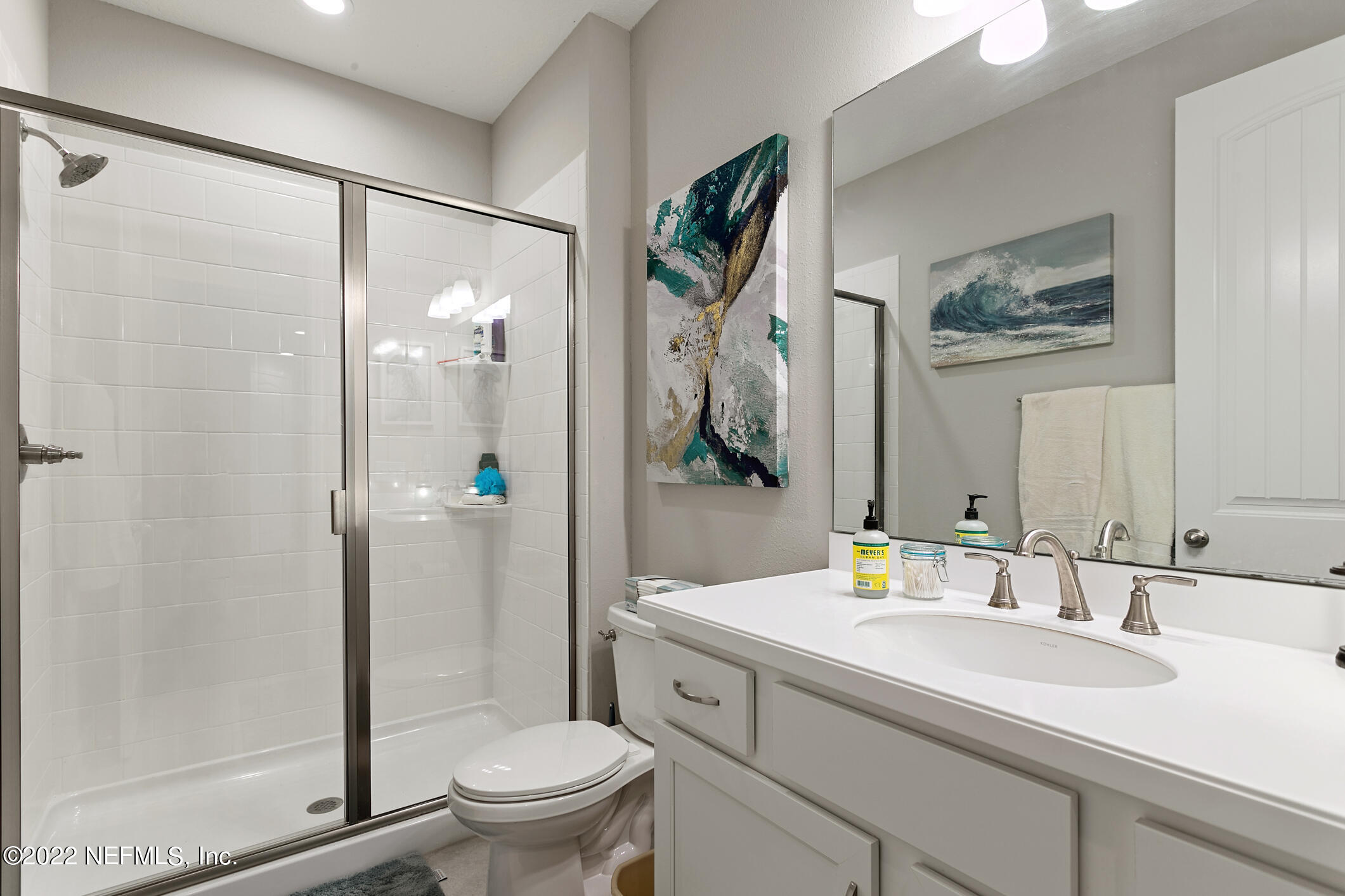 1098 Flach Drive St. Johns, FL 32259 - Photo 14 of 52 a bathroom with a granite countertop sink toilet and shower