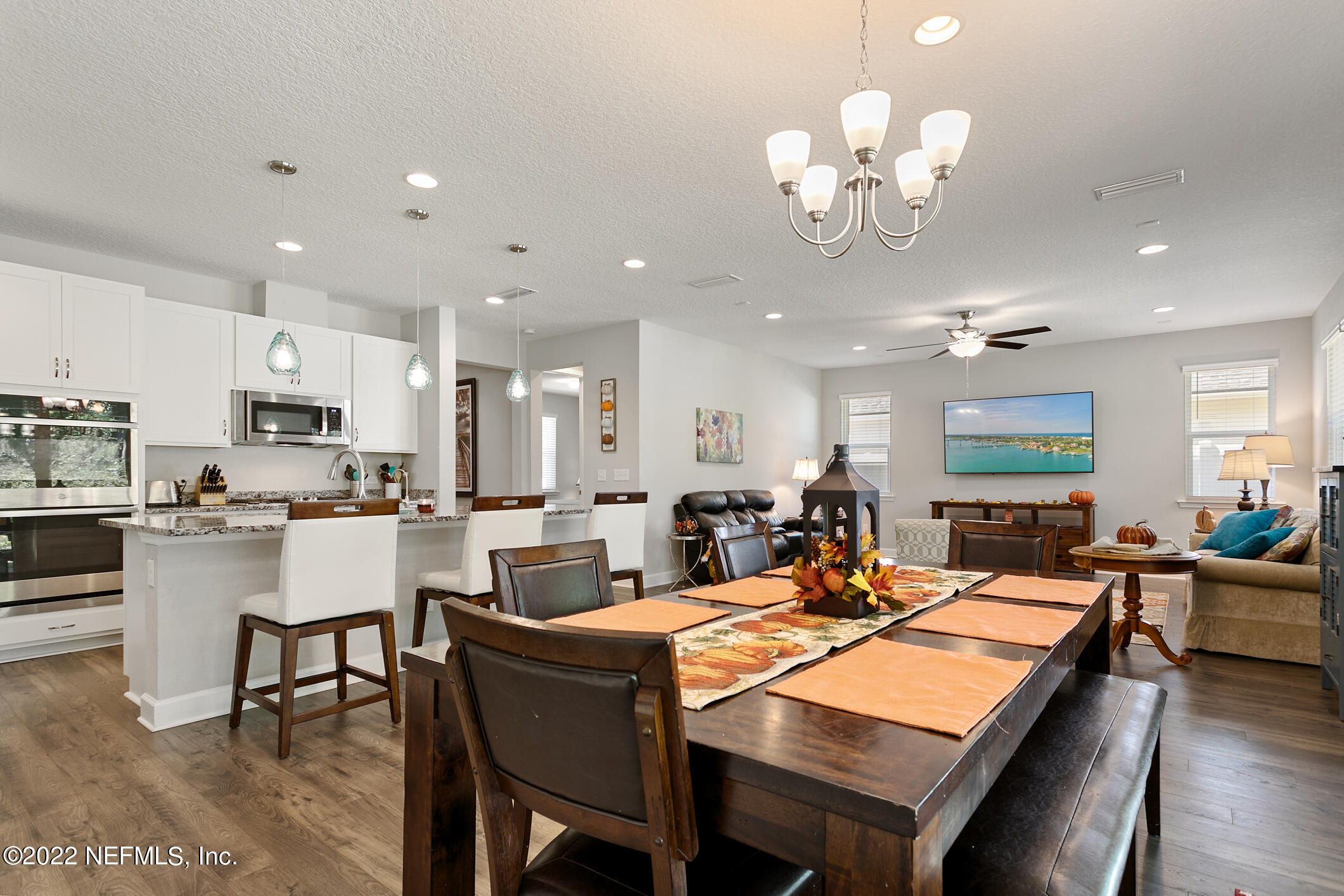 1098 Flach Drive St. Johns, FL 32259 - Photo 23 of 52 a large kitchen with a table and chairs