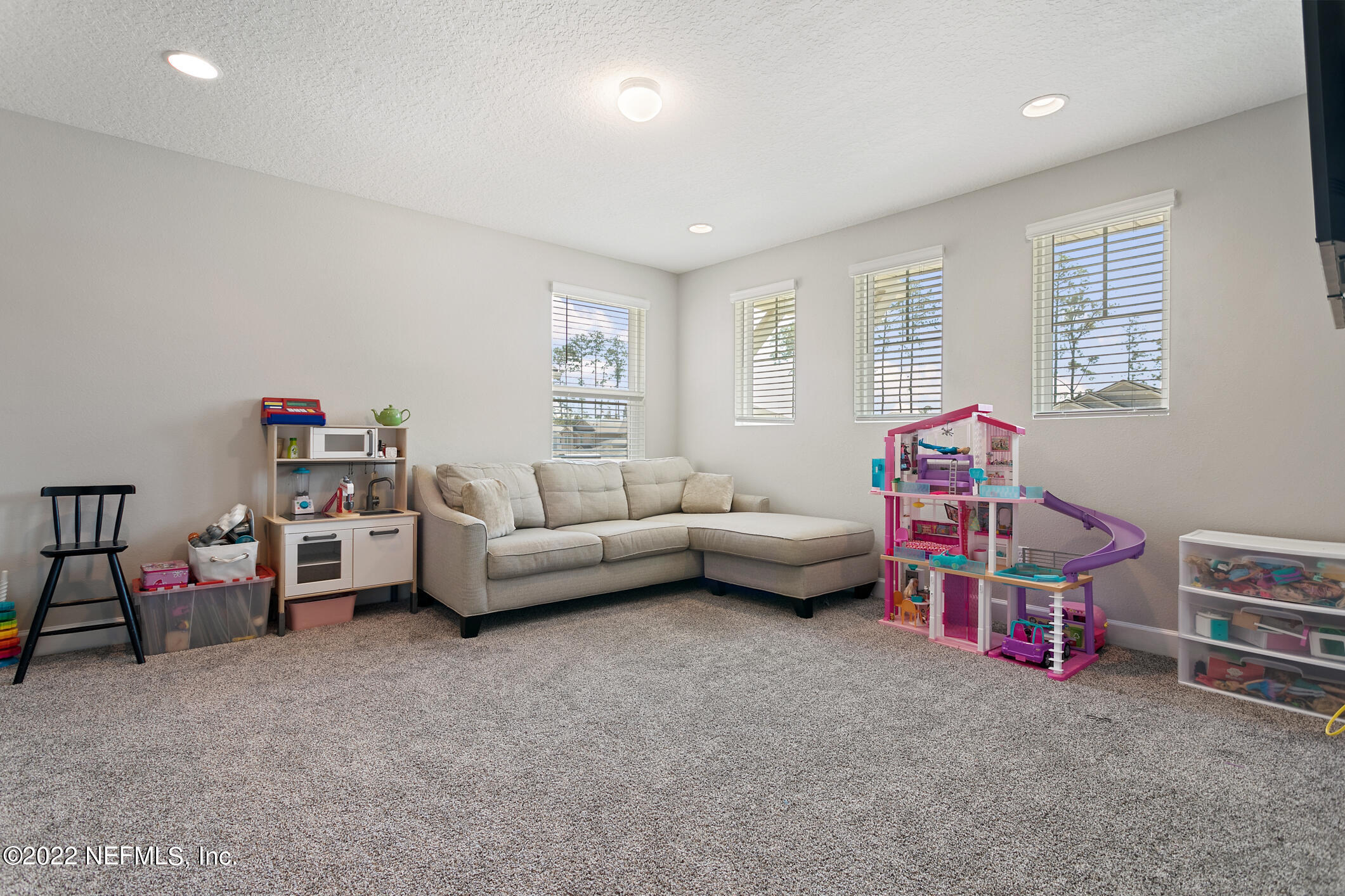 1098 Flach Drive St. Johns, FL 32259 - Photo 30 of 52 a living room with furniture and a window