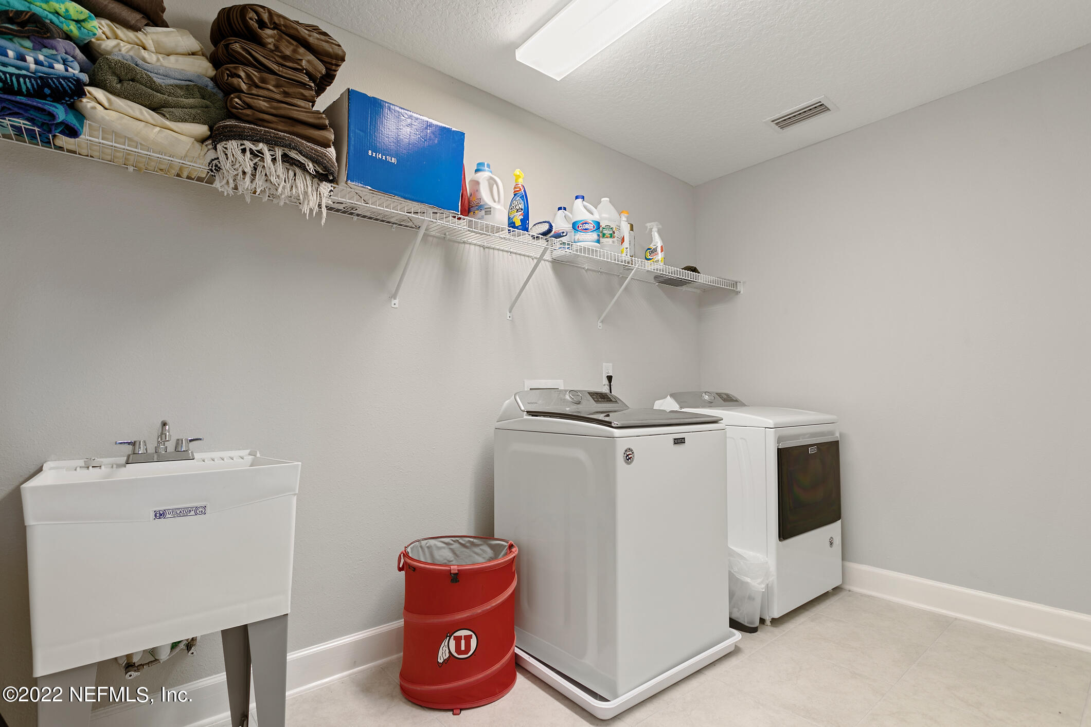 1098 Flach Drive St. Johns, FL 32259 - Photo 33 of 52 a utility room with dryer and washer