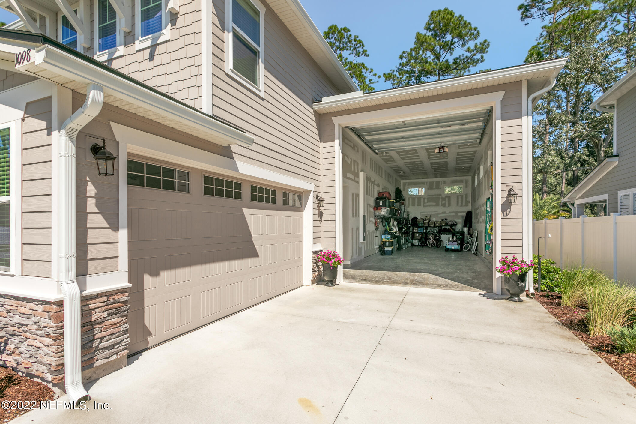 1098 Flach Drive St. Johns, FL 32259 - Photo 43 of 52 a front view of a house with a garage