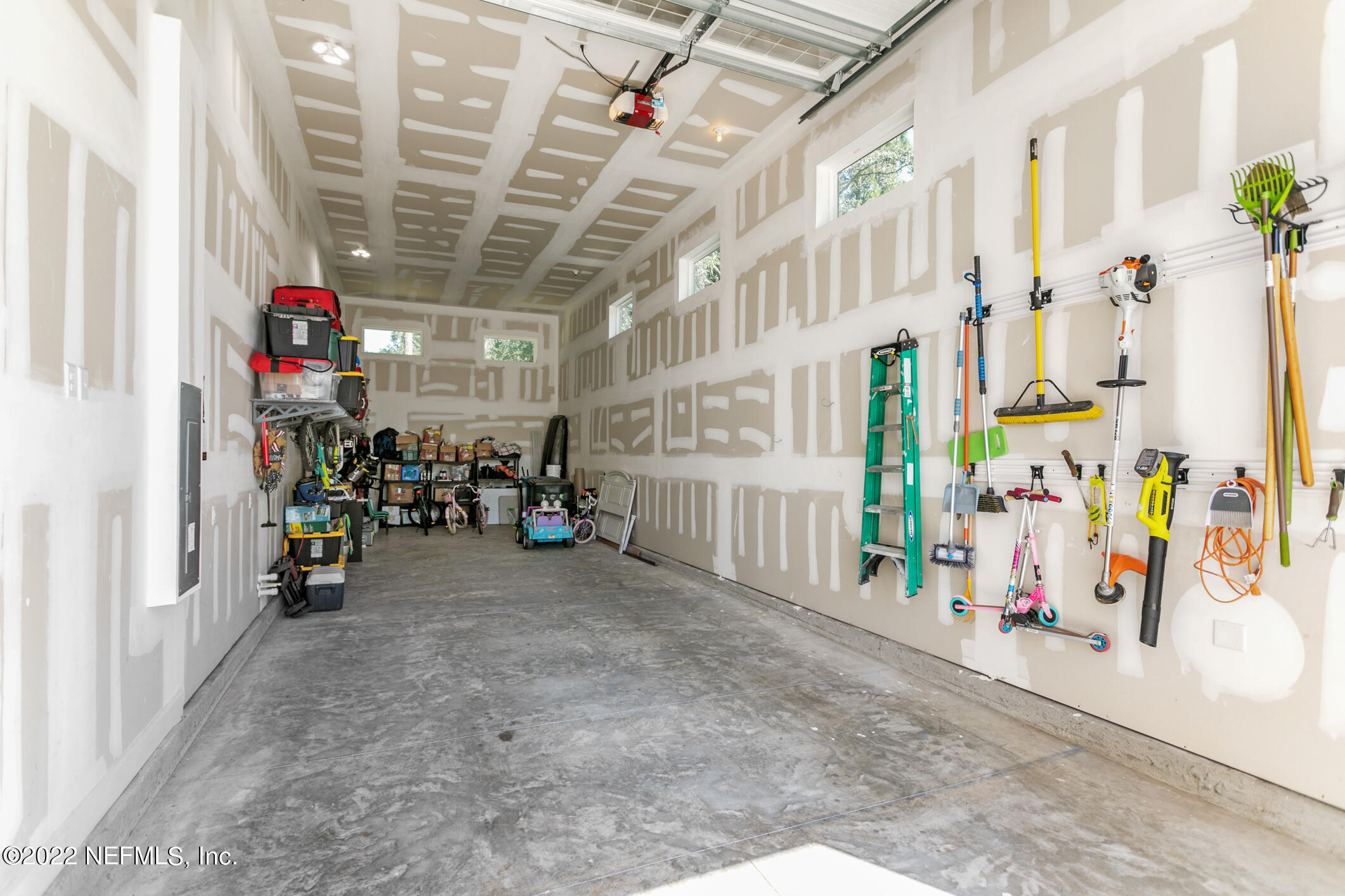 1098 Flach Drive St. Johns, FL 32259 - Photo 44 of 52 a view of a garage with storage