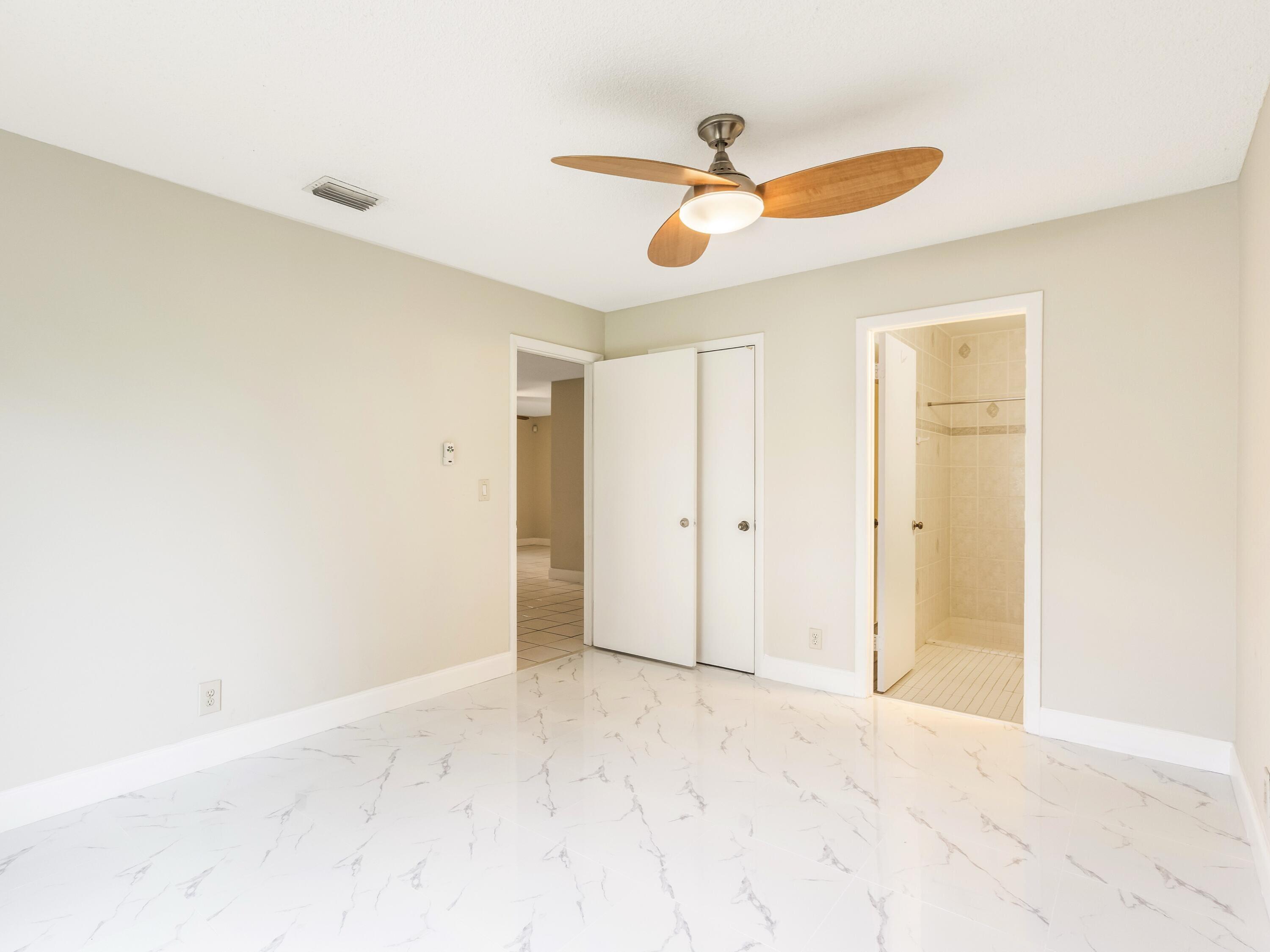 4806 Cherry Road West Palm Beach, FL 33417 - Photo 24 of 28 Primary Bedroom