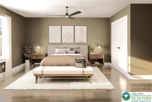 a bedroom with a large bed and a window