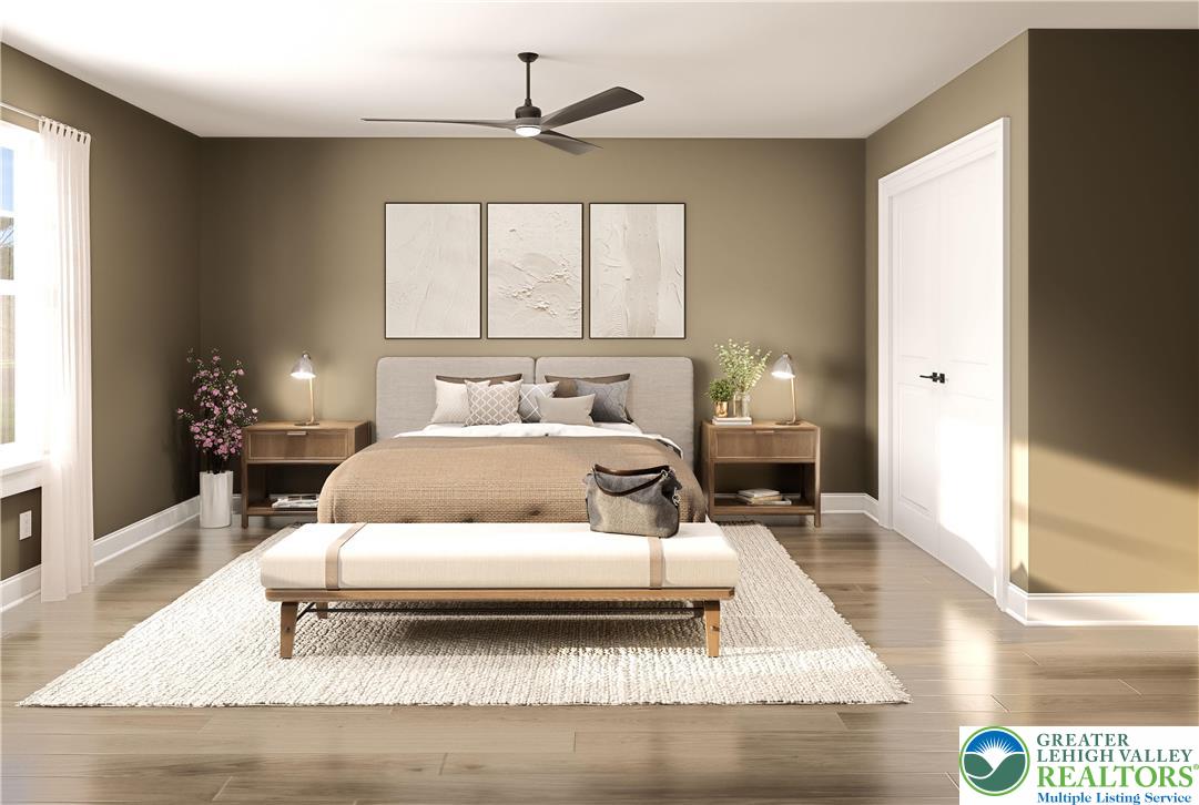 3 Grantarthur Court, Unit LIBERTY Whitehall, PA 18052 - Photo 17 of 21 a bedroom with a large bed and a window