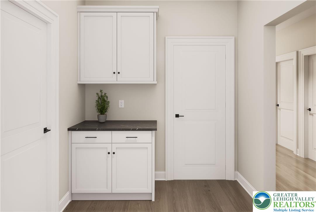 3 Grantarthur Court, Unit LIBERTY Whitehall, PA 18052 - Photo 8 of 21 a view of cabinets and wooden floor