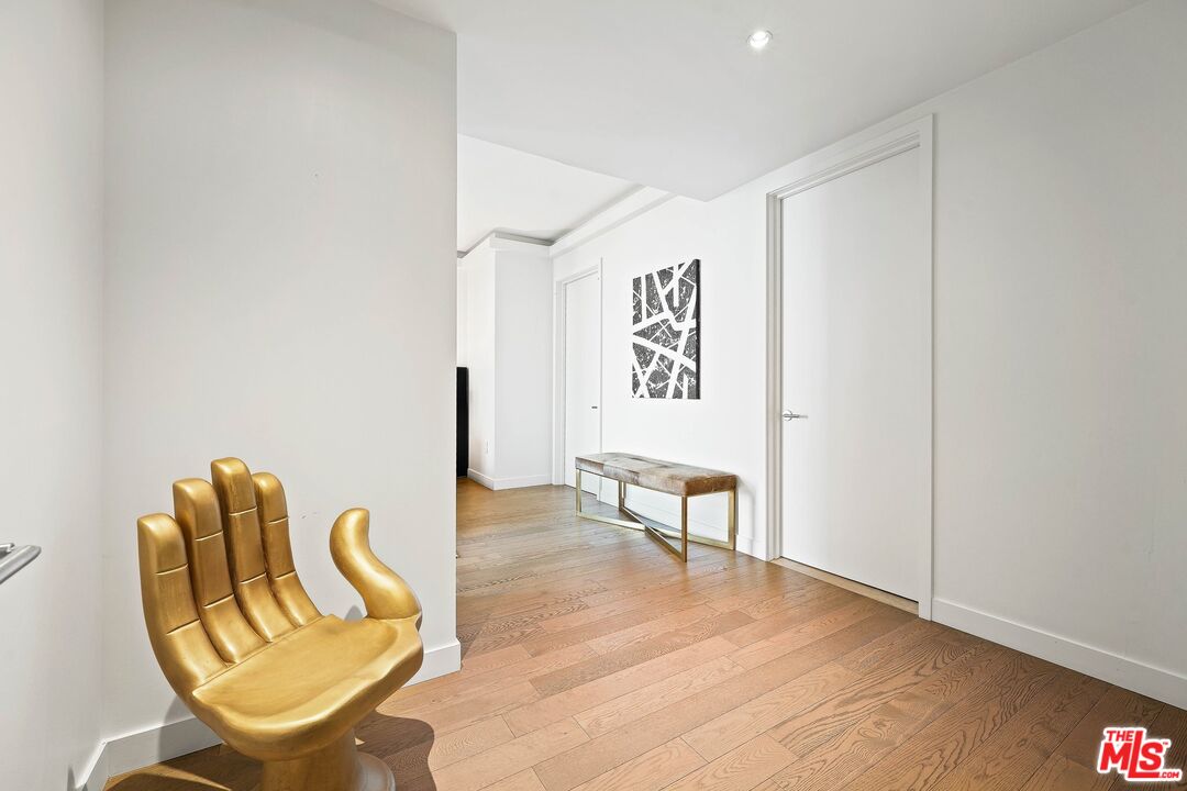 1755 Ocean Avenue, Unit 602 Santa Monica, CA 90401 - Photo 11 of 26 a view of a hallway with chairs