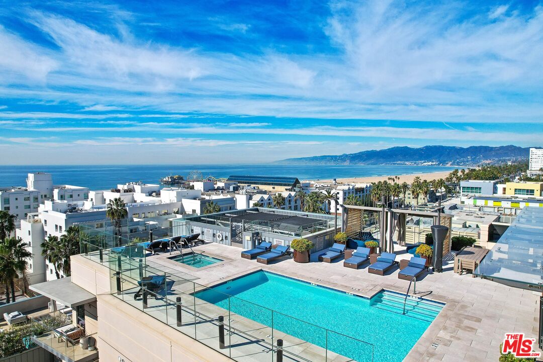 1755 Ocean Avenue, Unit 602 Santa Monica, CA 90401 - Photo 20 of 26 a view of a chairs and table on the terrace