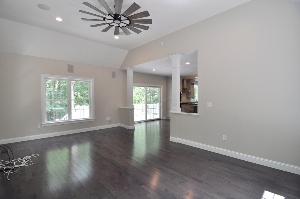 8 Maple Street Dunstable, MA 01827 - Photo 9 of 29 an empty room with wooden floor and windows