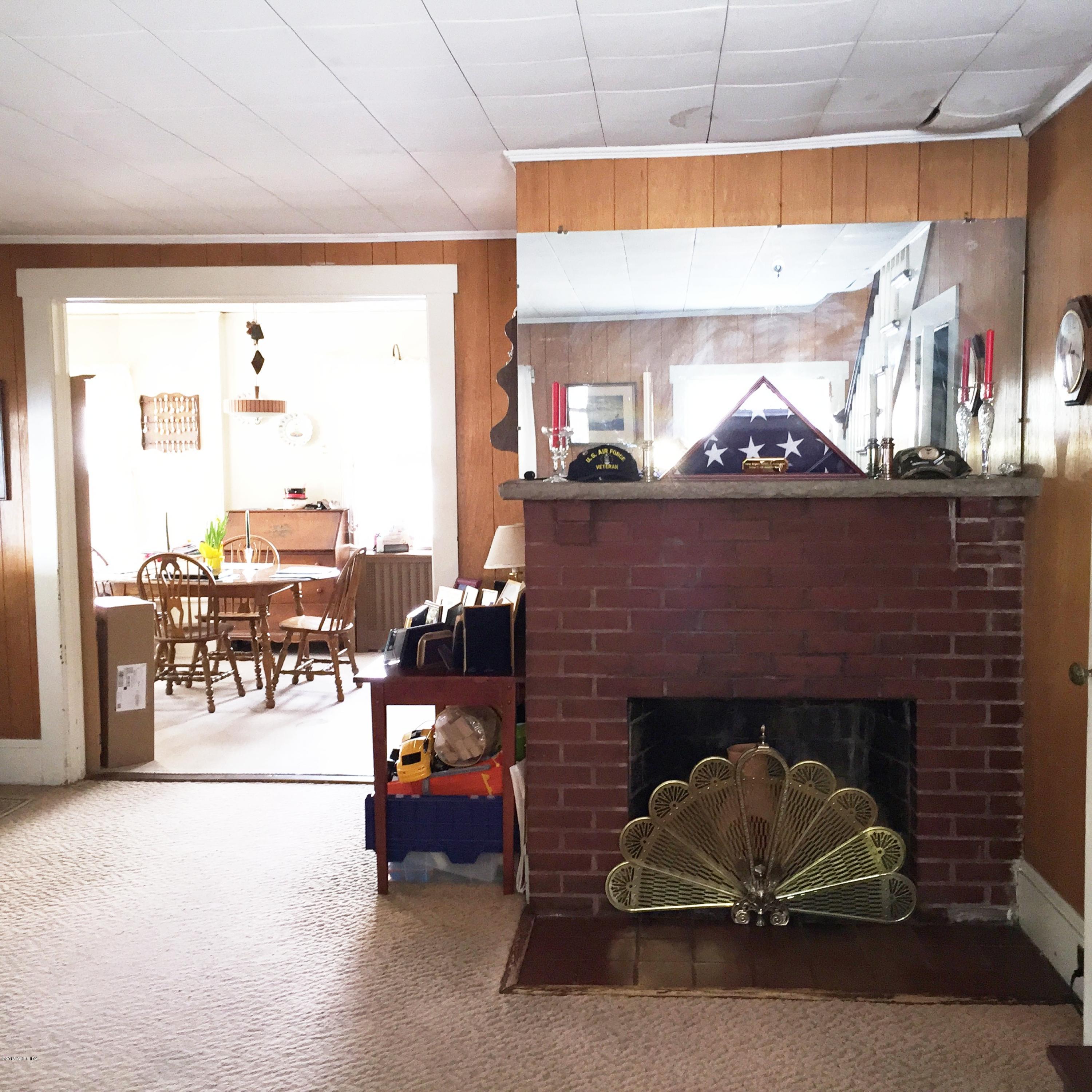 8 West View Place Riverside, CT 06878 - Photo 5 of 11 a living room with furniture and a fireplace