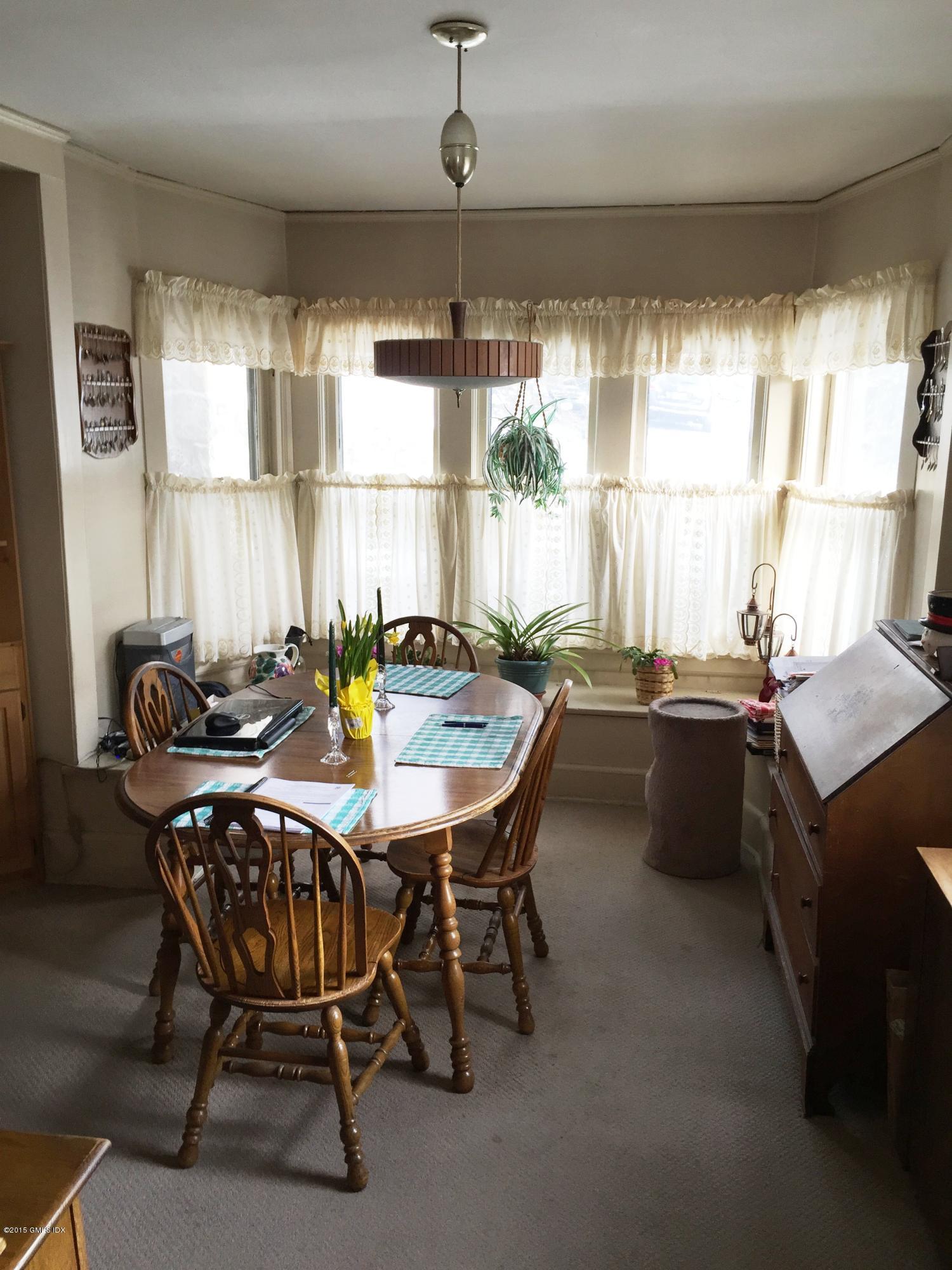 8 West View Place Riverside, CT 06878 - Photo 8 of 11 a dining room with furniture and window