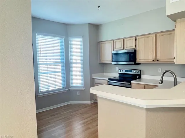 a view of a lake with houses