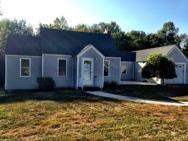 141 Shunpike Road Cromwell, CT 06416 - Photo 1 of 1 a front view of a house with a garden