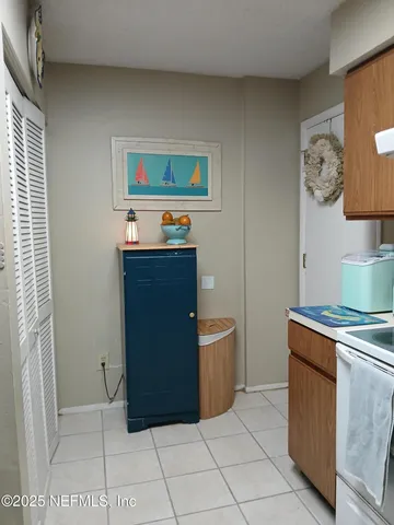 a room with cabinets and wooden floor