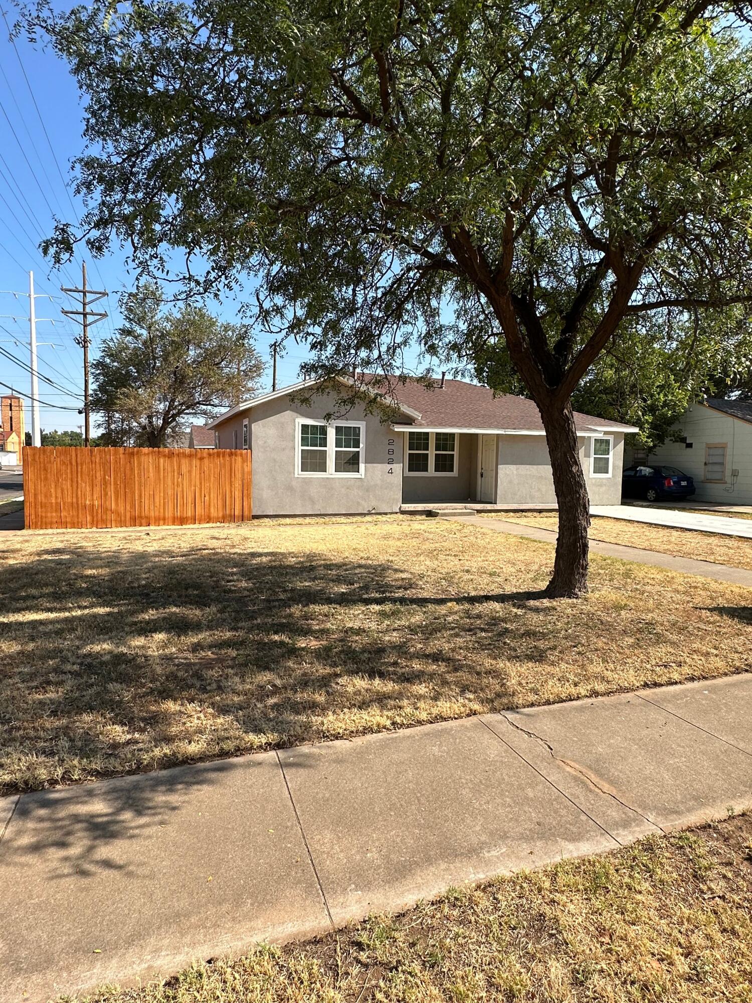 2824 35th Street, Unit A Lubbock, TX 79413 - Photo 2 of 16 a front view of a house with a ocean view