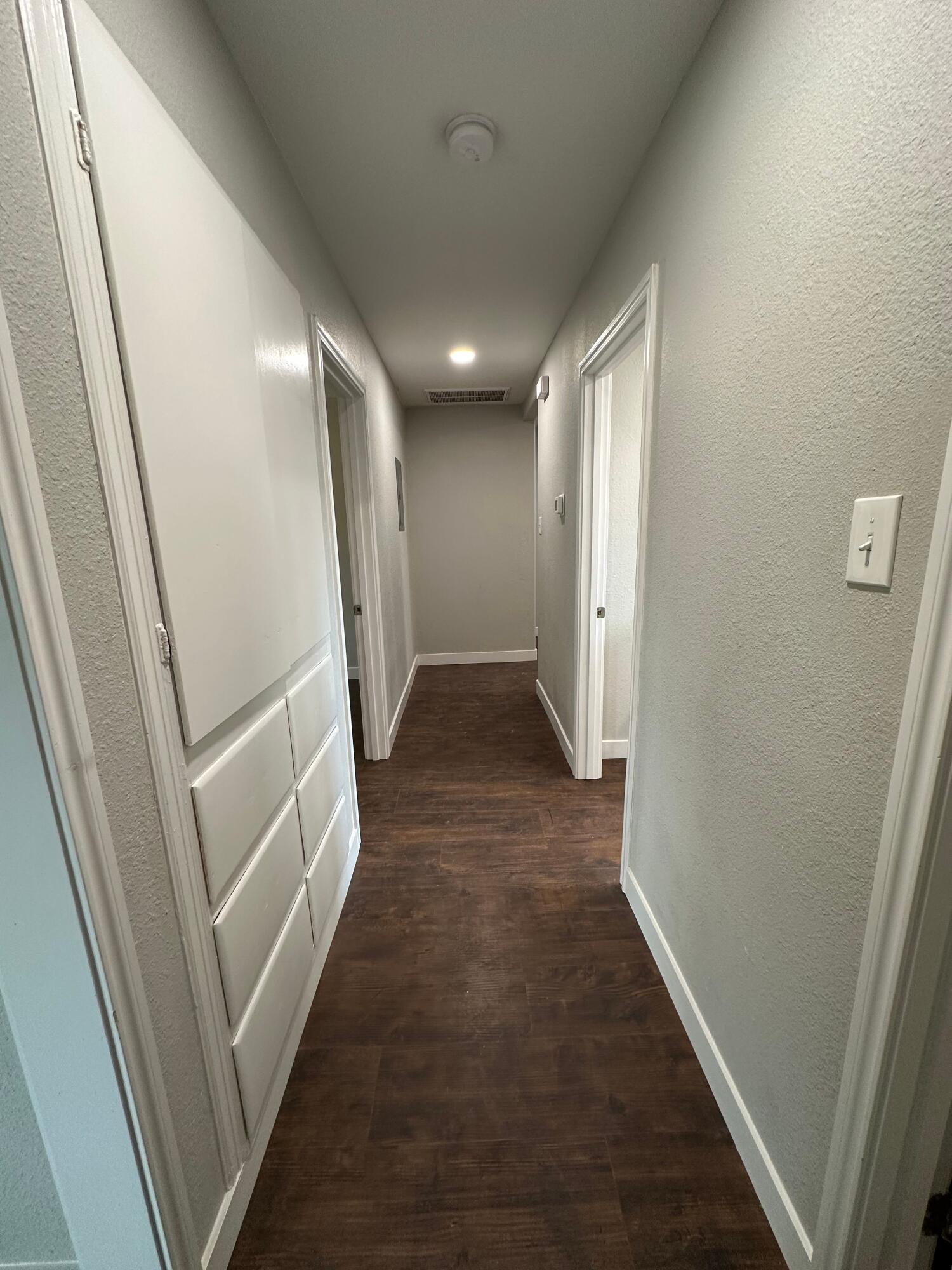 2824 35th Street, Unit A Lubbock, TX 79413 - Photo 7 of 16 a view of hallway with stairs