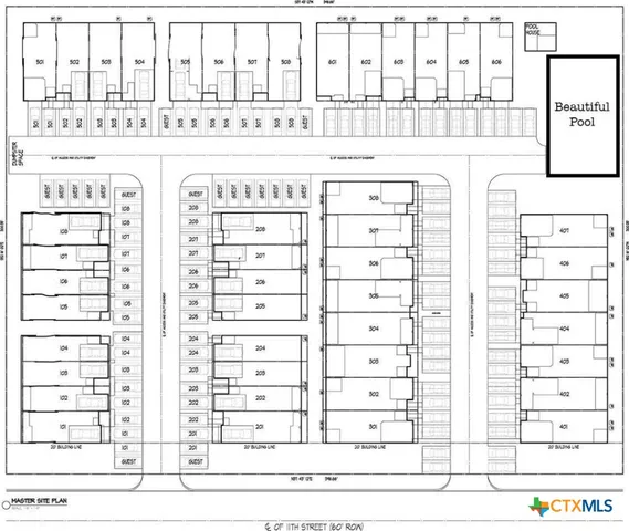 a patio with a table and chairs under an umbrella