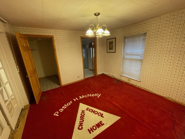 Undisclosed Address Maywood, IL 60153 - Photo 16 of 46 a view of an empty room