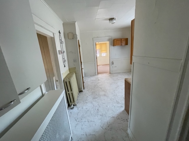 Undisclosed Address Maywood, IL 60153 - Photo 33 of 46 a view of a hallway with front door