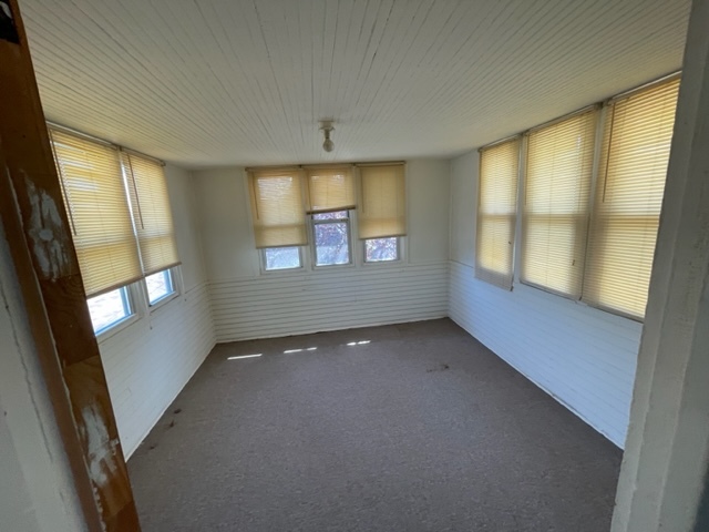 Undisclosed Address Maywood, IL 60153 - Photo 35 of 46 a view of an empty room with a window