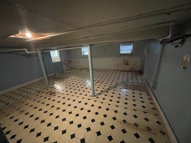 Undisclosed Address Maywood, IL 60153 - Photo 38 of 46 a bathroom with a glass door shower