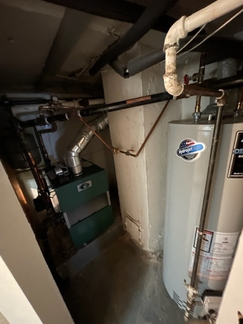 Undisclosed Address Maywood, IL 60153 - Photo 39 of 46 a view of water heater room