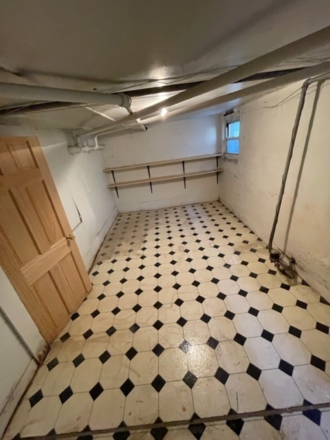 Undisclosed Address Maywood, IL 60153 - Photo 40 of 46 a bathroom with a black white checkered floor