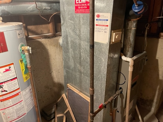 Undisclosed Address Maywood, IL 60153 - Photo 43 of 46 a bathroom with a sink and mirror