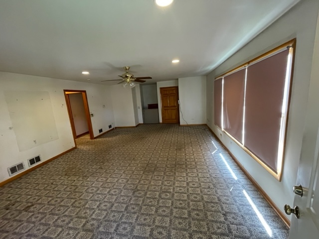 Undisclosed Address Maywood, IL 60153 - Photo 8 of 46 an empty room with a natural light
