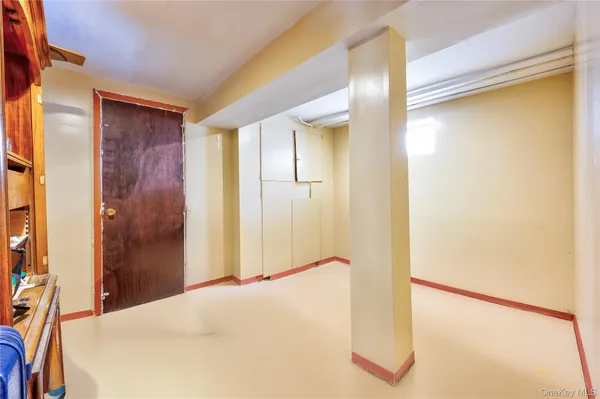 a view of balcony with wooden floor