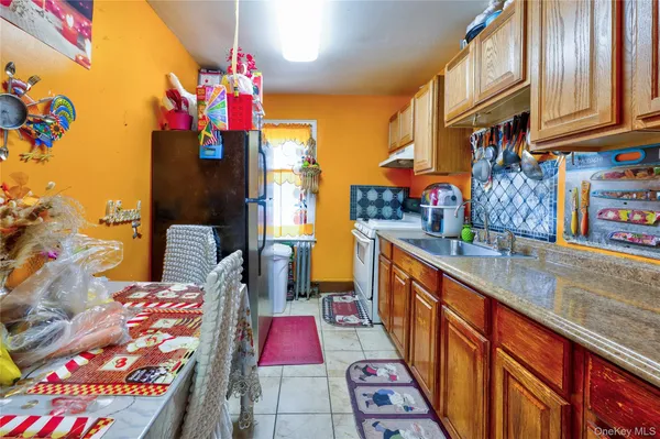 a bathroom with a sink and mirror with painted walls