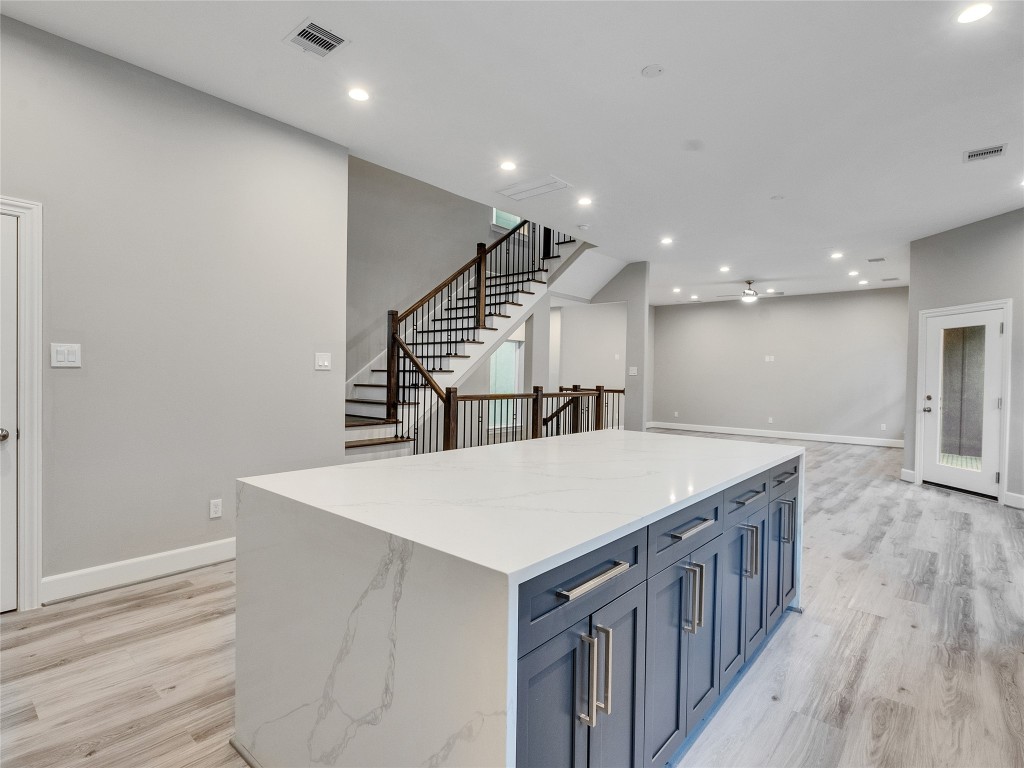 1122 West 16th Street, Unit C Houston, TX 77008 - Photo 21 of 38 Kitchen island equipped with ample storage space