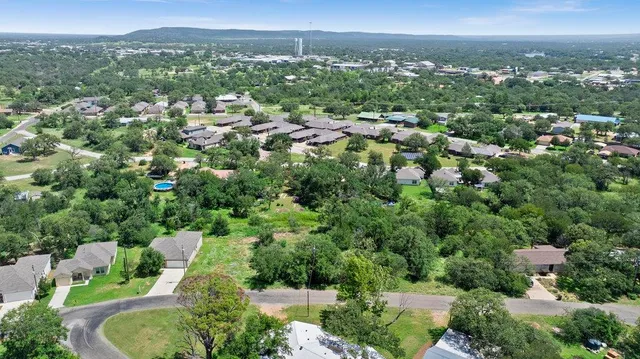 an aerial view of a city with lots of residential buildings