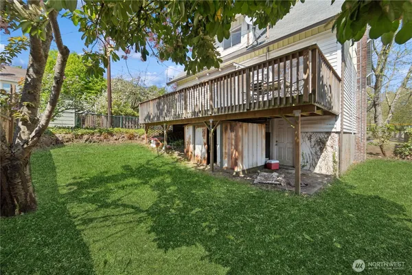 a view of a house with a yard porch and sitting area